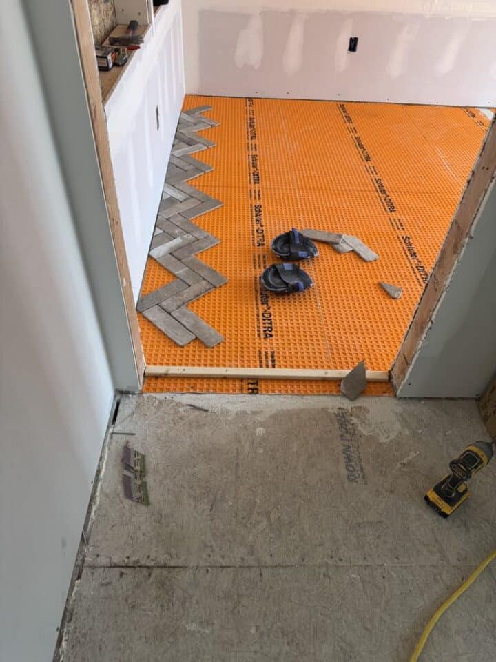 installation-of-herringbone-tile-floor-720x960-1 installation of herringbone tile floor