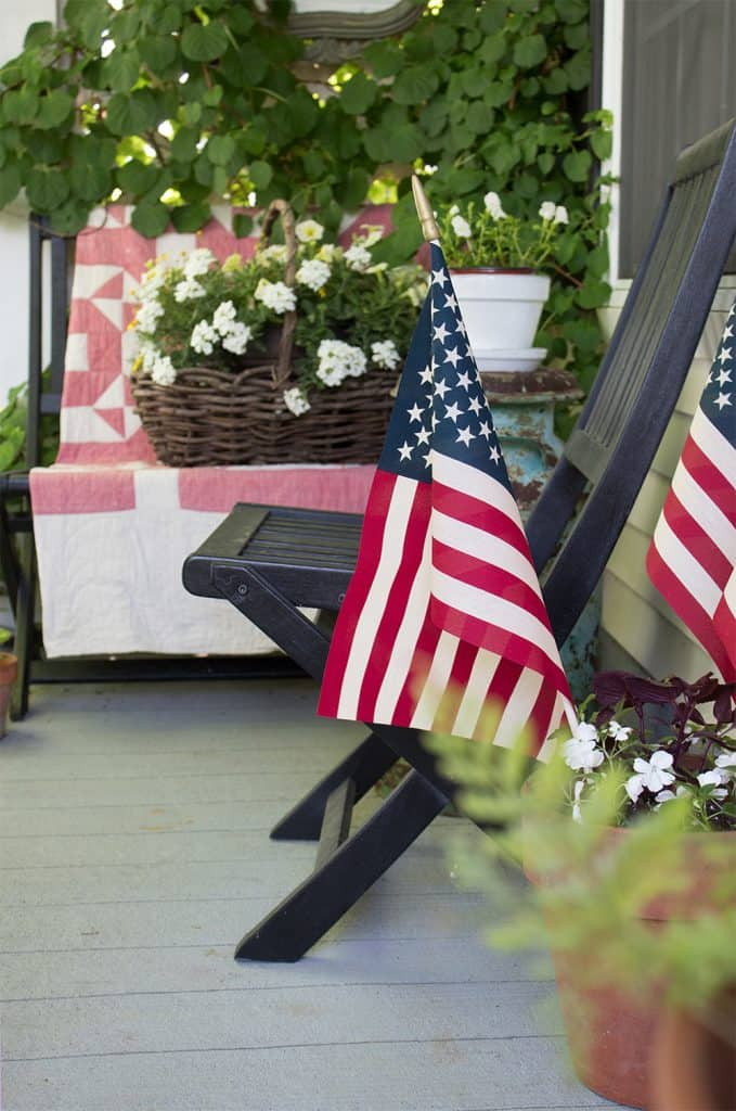 patriotic-porch-ideas-for-the-4th-of-july-679x1024-1 red white and blue front porch ideas - summer patriotic decorating ideas