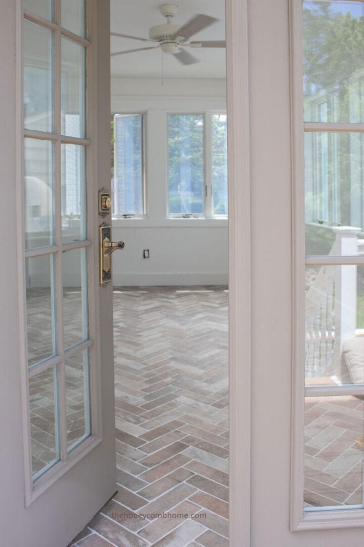 sunroom-french-doors-and-brick-herringbone-floors-the-honeycomb-home-720x1080-1 sunroom-french-doors-and-brick-herringbone-floors-the-honeycomb-home