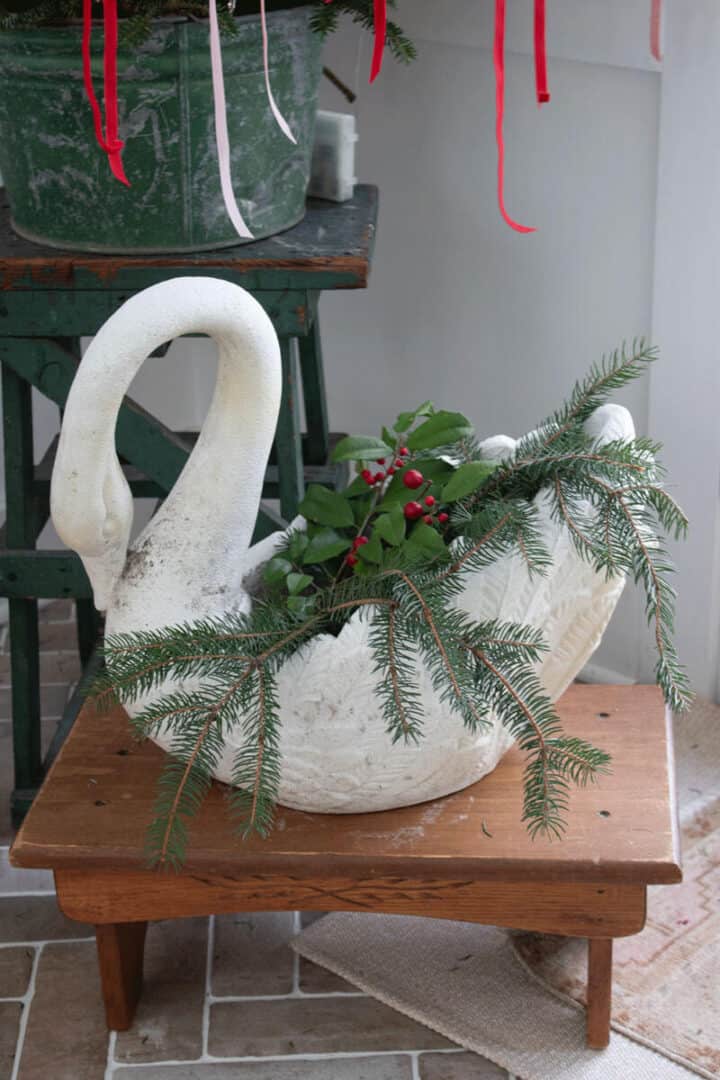 swan-planter-for-christmas-720x1080-1 Swan-planter-for-Christmas filled with holly berry branches