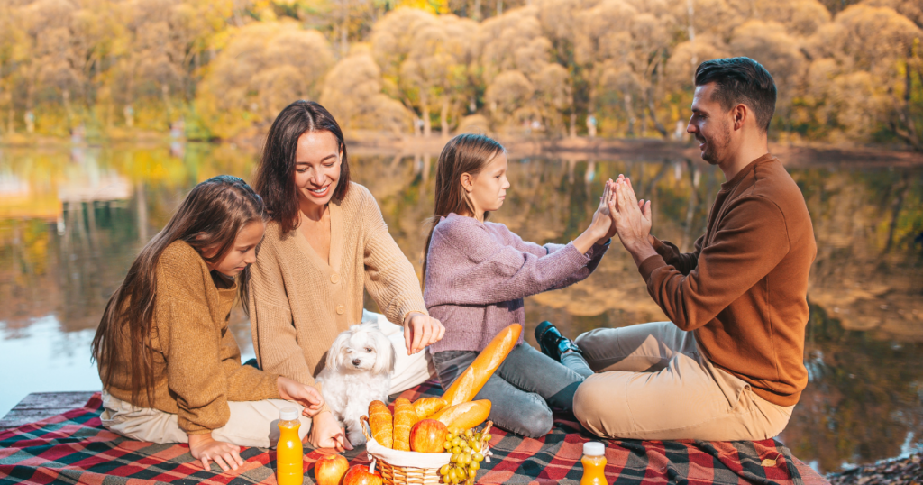 blog-post-pics-2-copy-1024x538-1 family having a picnic on a blanket