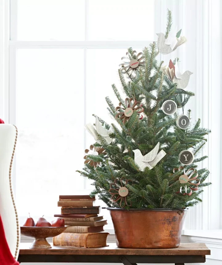 simple tabletop Christmas tree with paper ornaments